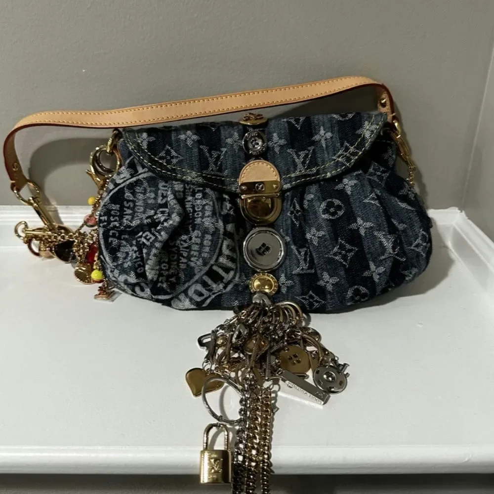 Louis Vuitton Limited Edition Blue Denim Monogram Denim Mini Pleaty Raye Customi
